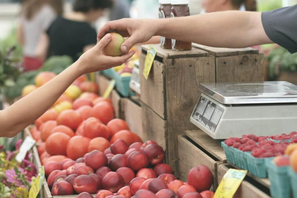 purchasing produce from a grocery store