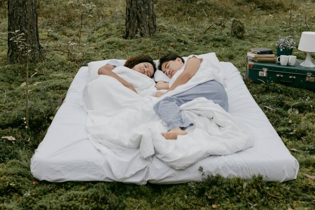 two people sleeping on a non toxic mattress